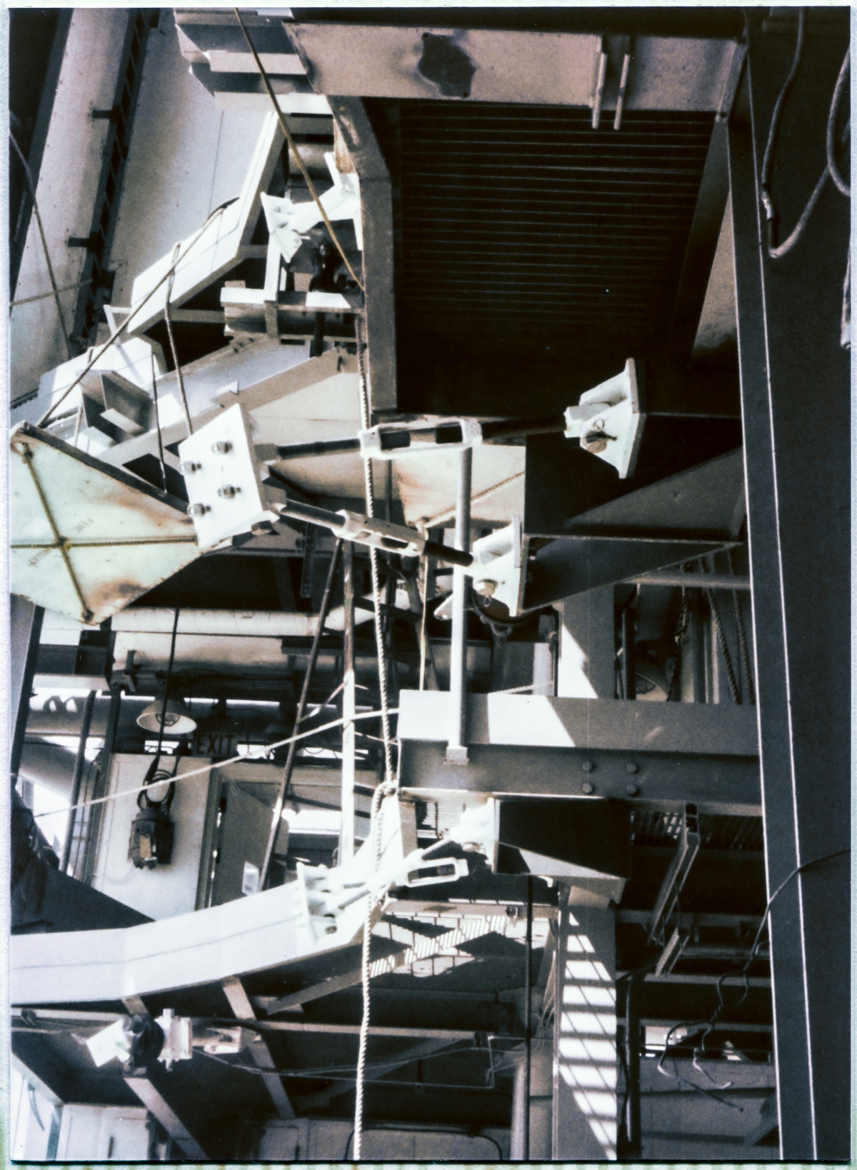 Image 067. The nightmare of complexity between the 112’ and 135’ elevations on the front side of the Rotating Service Structure at Space Shuttle Launch Complex 39-B, Kennedy Space Center, Florida, where the OMS Pod Heated Purge Covers were just about to be lifted into place and attached to the steel structure by Union Ironworkers from Local 808, working for Ivey's Steel Erectors. Photo by James MacLaren.